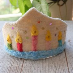 I tried to design a simple and elegant birthday crown with wool felt. I can prepare it with colored wool candles in colors suitable for your birthday concept. It is made entirely of wool. The back of the crown feels nice on the body. The crown can be secured with satin ribbon. Suitable for heads of all sizes, from baby to teenage girl. I will write your child's age on the crown. Please write me his age. I can make a crown in any other color. Felt Crown Pattern, Felt Birthday Crown, Candle Crown, Birthday Concept, Make A Crown, Felt Crown, Crown Pattern, Personalized Candle, Elegant Birthday