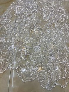 Beautiful Embroidery lace flower fabric with sequins This is a new style in high quality. Great for wedding dress, evening gown, Costume, cocktail dress Color: off white Width - 51 inches, Length -yard Wholesale acceptable, please convo me Shipping Time: United Sates: 10-15 working days United Kingdom:10-15 working days Canada: 10-15working days Australia: 10-15 working days Asia:4-8 working days Europe: 10-20 working days need express mail service , please contact us Elegant Lace Tulle Fabric For Banquet, Shinning Dress, White Lace Fabric, Scalloped Border, Beaded Lace Fabric, Bridal Lace Fabric, Bridal Wedding Dress, Tulle Flowers, Dress Tops