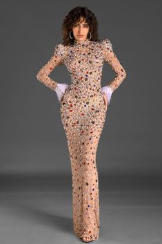 Enhance your charm with our long sleeve crystal maxi Dress, a vision of elegance and opulence. This stunning dress features long sleeves adorned with luxurious feathers at the cuffs, adding a touch of whimsical charm. The sheer fabric is embellished with sparkling crystals, creating a mesmerizing effect that captures the light beautifully. Perfect for glamorous parties, red carpet occasions, or upscale soirees. Handmade customization Fabric composition: 90% polyester fiber, 10% spandex Washing m Womens Cocktail Attire, Long Sleeve Bodycon Midi Dress, Concert Outfit Summer, Glamorous Party, Glamorous Dresses, Cocktail Attire, Summer Dress Outfits, September 2024, Bodycon Midi