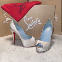 Iconic Limited Edition White Ivory Crepe Satin Hyper Very Priv 120 Christian Louboutin Bridal Collection Platform Heels With Blue Inner Soles In Pristine Condition. Will Include Box And Bag. They Have New Tips And Non-Slip Soles. #Bridalcollection #Louboutinweddingshoes #Christianlouboutinlimitededition #Christianlouboutinbluesoles #Limitededition #Christianloyboutinwedding #Ivorysatin #Limitededition#Bluesoles Luxury Wedding Shoes With Padded Heel And Round Toe, Luxury 4-inch Cream Heels, Elegant Open Toe Heels With Red Sole, Luxury White Wedding Shoes With Padded Heel, Wedding Heels With Open Heel, Luxury Red-sole Heels For Wedding, White Heels With Red Sole, Luxury Wedding Heels With Red Sole, Luxury Fitted Wedding Shoes With Padded Heel