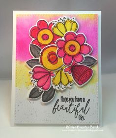 a handmade card with flowers on the front and bottom, saying hope you have a beautiful day