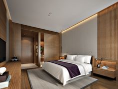 a bedroom with a large bed and wooden paneling on the walls, along with a flat screen tv