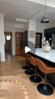 the kitchen is clean and ready to be used as a dining room or living room