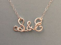 "Solid Sterling Silver wire is hand-formed and hammered. Perfect gift for your partner, friend, family or someone special. Initial&initial size: approx. 1/2\" height x 1\" width *Please leave your 2 initials in the note to seller box. . *Please choose your length from the selection box. *Gold (gold filled) version: https://www.etsy.com/listing/211178657/two-initials-necklace-with-ampersand-14k?ref=shop_home_active_22 Thank you." Dainty Sterling Silver Initial Necklace For Anniversary, Sterling Silver Initial Necklace For Anniversary, Sterling Silver Initials Necklace For Anniversary, Simple Sterling Silver Initial Necklace, Simple Sterling Silver Initial Necklace For Anniversary, Minimalist Sterling Silver Initial Necklace For Anniversary, Silver Initial Pendant Necklace For Anniversary, Sterling Silver Initials Name Necklace For Wedding, Silver Dainty Handmade Initial Necklace