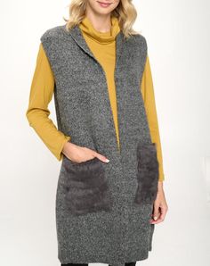 stylish and versatile addition to any wardrobe. Made with a cozy material 60% acrylic 38%nylon 2%spandex sleeveless vest Sweater knit featuring a furry pocket both fashionable and functional Perfect for layering THIS IS A FINAL SALE ITEM. NO EXCHANGES. NO RETURNS Planet Clothing, Wearable Art Clothing, Vest Sweater, Printed Tunic Dress, Liverpool Jeans, Cardigan Vest, Print Tunic, Sleeveless Vest, Sweater Knit