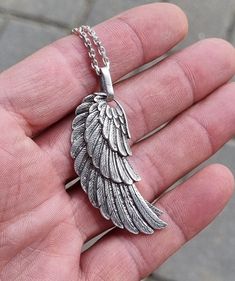 German ENGELSRUFER Angel Whisperer Silver 925 Wing Pendant Necklace RETIRED , first edition pendant Marked : ENGELSRUFER 925 (RM) Weight 14.5 gr Pendant size without ring for chain 47x20 mm ( SIZE L ) Sterling chain length 60 cm or 23.6" ( not short ) Your personal lucky charm - this wing pendant provides the optimal basis for individual design options. The protective wing envelops you in infinite security. The piece of jewellery convinces by the multitude of small details. PLEASE NOTE Vintage J Personalized Pendant, Lucky Charm, Lithuania, Angel Wings, Chain Lengths, Pendant Necklaces, Silver 925, Necklace Etsy, Jewelry Necklace Pendant