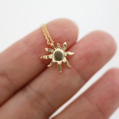 "Minimal and dainty sun necklace made of semmi-matte finishes sun charm with skinny gold plated brass chain. Sweet and soft. A perfect gift for birthday, anniversary, bridesmaids, graduation, friendship, sisters and for you! All items are packed individually in a gift box :) ► Chain length 14\" + 2\" extends chain/ 16\"+2\" extend chain / 18\"+2\" extend Chain ► Sun charm 1/2\"  ► Gold plated over brass   If you have any questions, please feel free to contact me. Thanks :)   ► Our production time is 1-3 business days ★ ►See more Nalydia jewelry  www.nalydia.etsy.com" Gold Charm Necklace For Summer Gifts, Dainty Sun-shaped Necklace For Gift, Dainty Sun Necklace For Gift, Gold Dainty Sun Design Charm Necklace, Dainty Gold Charm Necklace With Sun Design, Sun Charm, Sun Necklace, Gold Sun, Gift Graduation