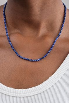 Beaded lapis lazuli necklace Unmistakably timeless gem in a deep and exquisite shade of blue Crafted to be worn alone or elegantly stacked Measures 18” 14k gold ball clasp Lapis is known for supporting spiritual enlightenment, diving into the inner world Ethically made in Los Angeles Necklaces sold individually Designer: Beatrice Valenzuela | Learn more about the Designer and shop the collection. Elegant Single Strand Blue Jewelry, Elegant Blue Single Strand Jewelry, Formal Blue Faceted Necklaces, Formal Blue Faceted Necklace, Sapphire Colored Lapis Lazuli Single Strand Necklace, Sapphire Single Strand Lapis Lazuli Jewelry, Sapphire Single Strand Necklace In Lapis Lazuli, Sapphire Color Single Strand Lapis Lazuli Jewelry, Sapphire Color Lapis Lazuli Necklace