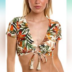 Cropped Short Sleeve Bikini Top With Removeable Soft Cups.Loop Tie At Front With Tassle Trim| Fabric: Microfiber Jersey 85% Nylon/15% Spandex| Care: Hand Wash Cold/Hang To Dry| Sun Protection: No| Closure: Pull With Loop Tie At Front| Chlorine Resistant: No| Adjustable: No| Cup Support: Removeable Soft Cups| Front Coverage: Moderate Coverage| Bottom Coverage: Moderate Coverage| Country Of Origin: Imported Description Go Swimming In Something Stylish! Get A New Vince Camuto Swimsuit For All Yur S Orange V-neck Swimwear For Vacation, Beachwear V-neck Tops With Tropical Print, Fitted Beachwear Tops For Vacation, Orange V-neck Swimwear For Spring, Beachwear Cropped Tops For Poolside, Printed Beachwear Tops For Pool, Beachwear Tropical Print Tops For Pool, Orange Beach Cover-up Swimwear For Spring, Tropical Print Tops For Pool