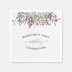 a greeting card with the words madeline's first birthday celebration on it and colorful flowers