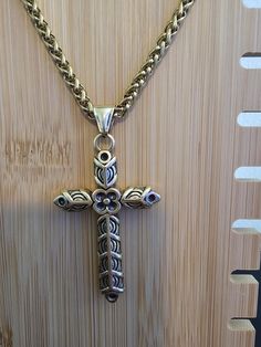 Ships Fast, From Florida, USA. Easy Returns If Not Satisfied.(But you will Love It) The Chain length is 24", Made from Stainless Steel. Pendant is 2" x 1 1/2" Nice Sturdy Necklace.  Choose Gold or Silver. Embrace the spirit of Ragnar Lothbrok with our Ragnar Necklace,  inspired by Viking and Norse mythology. Featuring a handcrafted  Ragnar cross and Athelstan cross design, this piece blends Viking,  pagan, and medieval Christian influences.  Perfect for fans of Viking jewelry and those  seeking a unique, historical touch.  Shop all our Jewelry Here. https://designsbyrobthomas.etsy.com Spiritual Metal Cross Necklaces, Spiritual Metal Pendant Cross Necklace, Spiritual Cross Jewelry In Metal, Spiritual Metal Cross Pendant Necklace, Spiritual Metal Cross Necklace, Adjustable Cross Chain Jewelry, Nickel-free Gold Cross Necklace, Metal Cross Necklace With Box Chain, Spiritual Cross Pendant Necklace For Jewelry Making