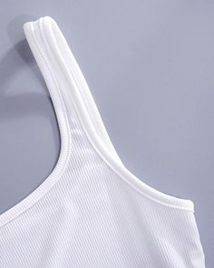 Details: Essential ribbed braletTop Length: CroppedSleeve Length: SleevelessMaterials:95% Polyester + 5% Spandex Sleeveless Ribbed Crop Top For Summer, White Sleeveless Seamless Crop Top, Ribbed Sleeveless Stretch Crop Top, Ribbed Stretch Crop Top With Tank Straps, Stretch Ribbed Sleeveless Crop Top, Fitted Ribbed Sleeveless Crop Top, Stretch Ribbed Crop Top With Tank Straps, Sleeveless Ribbed Stretch Crop Top, Fitted Sleeveless Ribbed Crop Top