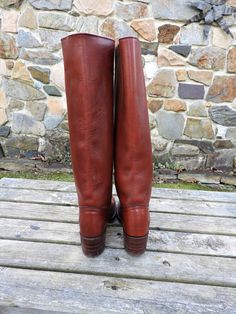 "Vtg 1970's Frye Dark Brown Western Boots, Heeled Ladies Boots, Leather Riding Boots sz 5 1/2 B This is a great pair of vintage ladies Frye Riding Boots. Known for their quality boots, these Frye Western Style Pull-On Boots are no exception. They are almost a deep reddish brown color with some distressing which I really like. These boots are well marked with the Frye mark at the heel of the boot as well as on the inside. Made of very thick and durable leather, these boots are certain to last for Vintage Moto Boots With Snip Toe And Leather Lining, Vintage Snip Toe Moto Boots With Leather Lining, Fitted Vintage Boots With Goodyear Welt, Fitted Vintage Boots With Goodyear Welted, Vintage Brown Knee-high Moto Boots, Vintage Moto Boots With Goodyear Welt And Snip Toe, Vintage Goodyear Welted Boots For Fall, Vintage Wide Calf Knee-high Boots, Vintage Brown Knee-high Boots