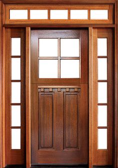 a wooden door with glass panels on the side