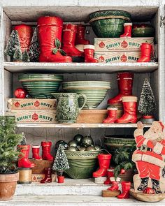 a shelf filled with lots of christmas items