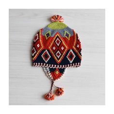 Peruvian hat, chullo with embroidered details, handmade woolen hat. Colorful chullo hat handmade in the south of Peru by women. Article number: 22-4203-05 Color: multi Material : 100% sheep wool Dimensions: Width 24 cm / 9.5 inch Weight: 0.15 lbs / 0.07 kg Price including shipping. World wide delivery Traditional Adjustable Beanie Bonnet, Traditional Adjustable Beanie Hat, Warm Beanie Hats For Festivals, Bohemian Knitted Beanie, Bohemian Knitted Alpaca Hat, Warm Adjustable Festival Hat, Bohemian Knitted Beanie Cap, Bohemian Wool Hat For Winter, Warm Bohemian Beanie Hat