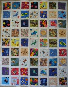 a large quilt with many different pictures on it