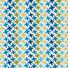 a blue and green pattern on white fabric