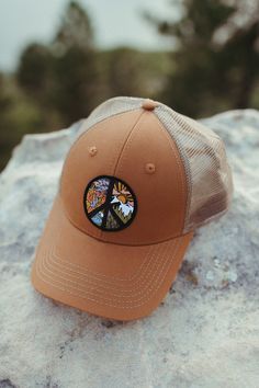 Discover Atomicchild's Circle of Peace Classic Trucker Hat - a timeless 6-panel accessory with a snapback closure for a perfect fit and a classic woven patch. Versatile, comfortable, and adorned with a symbol of peace and unity. Get yours now! Retro Adjustable Hat With Embroidered Patch, Adjustable Snapback Hat With Embroidered Patch For Outdoor, Adjustable Trucker Hat With Embroidered Patch And Curved Bill, Adjustable Trucker Hat With Embroidered Patch, Outdoor Adjustable Baseball Cap With Embroidered Patch, Adjustable Hat With Embroidered Patch And Curved Bill, Adjustable Brown Hat With Embroidered Patch, Adjustable Flat Brim Hat With Embroidered Patch, Adjustable Snapback Hat With Embroidered Patch