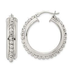 Sterling silver polished and diamond-cut detailed beaded hoop earrings. Measure approximately 1 3/16"L x 1 1/16"W and have wire and clutch closures. Beaded White Gold Round Jewelry, Elegant Sterling Silver Hoop Earrings With Round Beads, Hinged Hoop Metal Jewelry, Hoop Earrings With Silver Beads, Silver Hoop Jewelry With Diamond Cut, Silver Hoop Beaded Jewelry, Silver Hoop Earrings With Silver Beads, Silver Beaded Hoop Jewelry, Silver Earrings With Polished Beads