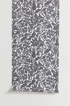 a piece of paper with an intricate pattern on the front and back of it, in black and white