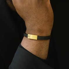 The Grady is a handmade bracelet featuring a slim cowhide leather strap. The design is comfortable, minimalist, straightforward, and stylishly refined.- WIDTH: 8 mm- MATERIAL TYPE: 100% genuine pebbled cowhide leather- CLASP COLOR: Brushed gold- CLASP MATERIAL: 316L stainless steel, 18K gold PVD plated- CLASP TYPE: Magnetic Elegant Leather Bracelet With Gold Clasp, Modern Gold Leather Bracelet For Everyday, Gold Modern Leather Bracelet For Everyday Wear, Luxury Everyday Leather Bracelet, Luxury Gold Leather Bracelets, Elegant Leather Bracelets With Gold Clasp, Modern Yellow Gold Leather Bracelet, Modern Adjustable Leather Bracelet With Wrist Strap, Modern Yellow Gold Leather Bracelet For Formal Wear