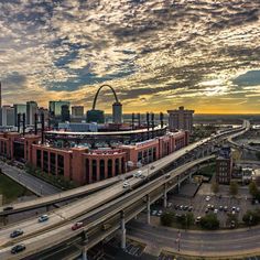 an aerial view of the st louis baseball stadium in st louis, missouri at sunset