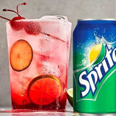 two sodas and a can of spriter are sitting next to each other