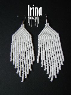 Beautiful beaded modern white earrings with fringe. Very lightweight. Measurements: Length - 7 cm Width - 2,5 сm Materials: Silver plated ear hooks Czech glass beads Nylon Thread Patience and Creativity .. ready to be given away ! Contact me if you have any questions. I will be happy to answer :) More necklaces from glass or stones: https://www.etsy.com/shop/IrinaHaluschak?ref=seller-platform-mcnav§ion_id=17111035 Beaded earrings: https://www.etsy.com/shop/IrinaHaluschak?ref=seller-platform-mcna White Beaded Earrings, Beautiful Beaded Earring, Jewelry Sets Handmade, Beaded Jewlery, Beaded Tassel Earrings, Beaded Wedding, Bead Work Jewelry, Beaded Drop Earrings, White Earrings