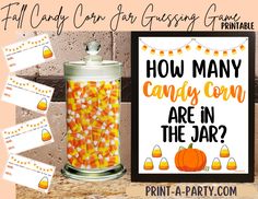 candy corn is in the jar and next to it is a printable sign that says how many candy corn are in the jar?