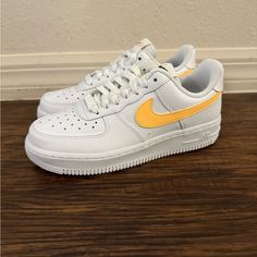 Nike Air Force 1 07 White/Orange Women’s Sneakers Fq2742-100 Casual White Nike Air Force 1, White Synthetic Nike Air Force 1 For Light Sports, Orange Synthetic Sneakers For Light Sports, Sporty White Nike Air Force 1 With Gum Sole, Casual Orange Low-top Nike Air Force 1, Nike Air Force 1 Orange For Streetwear, Orange Low-top Nike Air Force 1, Sporty Orange High-top Nike Air Force 1, Casual Orange Nike Air Force 1