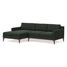 a black sectional couch with wooden legs