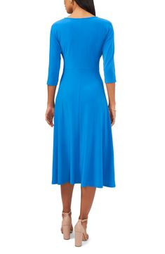 A drapey tie tethers the waist of this figure-accentuating midi that saunters and sways from work to play. 48 1/2" length Jewel neck Three-quarter sleeves 95% polyester, 5% spandex Machine wash, line dry Imported Chic Solid Color Half Sleeve Midi Dress, Chic Stretch Midi Dress With Half Sleeves, Solid Short Sleeve Midi Dress In Elastane, Flattering Short Sleeve Elastane Midi Dress, Flattering Short Sleeve Midi Dress, Flattering Short-sleeved Elastane Midi Dress, Fit And Flare Elastane Midi Dress, Solid Short Sleeve Midi Dress, Solid Color Short Sleeve Midi Dress