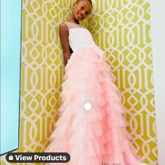 This Gown Is Beautiful And Feminine With Layers Of Frothy Tulle And Ruffles. The Ruffle Panels Create A Flattering Textured Playful Look. Pink Skirt With White Embellished Bodice. Perfect For The Holidays, Cotillions, And Junior Proms. Sizes 2-13. Special Order If You Do Not See Your Size. Allow 14 Days For Delivery After You Place The Order. Party Gown With Tulle Ruffled Skirt, Tiered Tulle Gown For Debutante Ball, White Princess Dress With Ruffles For Prom, Pageant Organza Gown With Ruffles, Floor-length Princess Dress With Ruffles For Wedding, Tiered Ruffle Gown For Debutante Ball, Princess Style Tulle Floor-length Gown, Princess Style Floor-length Tulle Gown, Tulle Pageant Dress With Tulle Skirt