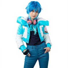 a woman with blue hair and headphones standing in front of a white background,