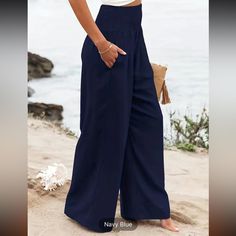 New Wide Leg, High Waist Pants With Pockets. New In Package Color: Navy Blue Material: 95% Polyester, 5% Spandex Measurements: Waist- 30” Hip- 40.5” Inseam- 28.4” Stretch Bottoms For Vacation In Solid Color, Vacation Bottoms With Stretch And Solid Color, Stretch Solid Color Bottoms For Vacation, Vacation Bottoms With Stretch In Solid Color, Vacation Stretch Bottoms In Solid Color, Stretch Solid Color Pants For Beach, Stretch Solid Color Beach Pants, High Waist Solid Color Pants For Vacation, Straight Leg Beach Bottoms In Solid Color