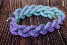 "Braided Wide Chain Necklace, double-sided purple turquoise necklace made of czech beads. The color of the necklace is perfect for summer, it will suit your any dress or denim style. It is interesting and bright at the same time. This is the perfect stylish original accessory for you or your friends. This is a great idea for a birthday present or any other occasion. Available in a different colour and size, just contact me If you have any questions regarding this item, please hit the \"Ask a Que Single Strand Purple Beads For Gift, Purple Beaded Chain Necklace, Purple Single Strand Beads For Gift, Purple Single Strand Beads As A Gift, Elegant Purple Necklaces For Beach, Elegant Purple Necklace For The Beach, Elegant Purple Necklace For Beach, Blue Lariat Necklace With Round Beads For Gift, Bohemian Purple Necklace With Lobster Clasp