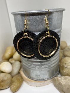 "Beautiful handmade item, real genuine leather earrings, includes a coordinating shape charm in a variety of metals and color options, bronze, silver and gold. Earring colors are black, rich cognac brown weathered leather and camel/mustard. Mustard is silver charm and hook Cognac brown is bronze charm and hook Black is gold charm and hook All available in round or teardrop. Round measures Aprox 1.5\" and teardrop Aprox 2\"" Black Leather Earrings As A Gift, Handmade Black Leather Earrings, Black Leather Drop Earrings, Gold Leather Dangle Earrings, Gold Leather Earrings For Gift, Shape Circle, Large Necklace, Glitter Earrings, Fall Earrings