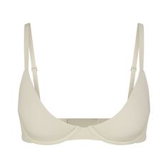 This lightly lined, buttery-soft scoop bra is engineered for an ultra-comfortable, barely-there fit with innovative cup technology to fit in between sizes. Features flexible, supportive underwire, adjustable straps, and hook and eye back closure. Fits true to your SKIMS bra size. Everyday Solid Bra With Adjustable Straps, Classic Underwire Bra With Soft Touch, Everyday Seamless Underwire Bra, Everyday Full Coverage Padded Bra, Everyday Full Coverage Padded Nursing Bra, Everyday Full Coverage Bra With Padded Cups, Everyday Full Coverage Soft Touch Bra, Everyday Seamless Underwire Nursing Bra, Everyday Underwire Bra With Built-in Support