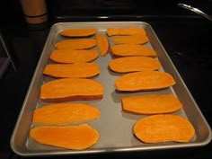 several pieces of bread sitting on top of a baking sheet in the oven, ready to be baked