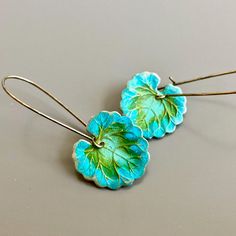 "Small Patina Leaf Earrings - Gorgeous Verdigris Leaves with Long Antiqued Brass Earwires. The fourth picture shows the back. It is not patina'd. Leaves are slightly 20mm (.75\") in diameter Earrings measure 1.75\" from top of earwire to bottom of leaf This is a stock photo. Patina varies slightly. Larger version of these earrings: https://www.etsy.com/listing/646432235/leaf-earrings-patina-jewelry-leaf?ref=shop_home_active_1&frs=1 Be sure to check out my Verdigris Collection for similar ite Elegant Patina Earrings, Handmade Blue Leaf-shaped Jewelry, Green Bohemian Patina Earrings, Handmade Leaf-shaped Botanical Jewelry, Green Leaf-shaped Botanical Jewelry, Patina Jewelry, Silver Dragonfly Necklace, Earrings Nature, Dragonfly Jewelry