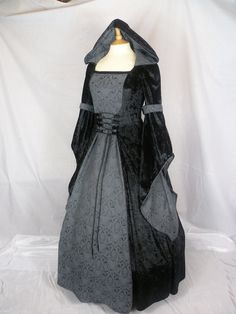 This is for a custom made dress,it will be made to the measurements you send me. Please send me your bust,waist and hip measurement,and please measure from the top of your shoulder to the floor with shoes on. It will be made with beautiful black crushed velvet and stunning grey and black jacquard  .It will have a corset style front and back with black lacing so you can adjust the dress to fit your body shape. Combined shipping on multiple items. If you purchase express shipping by courier please send me your phone number thank you. Customizable Length Ball Gown With Fitted Bodice, Gothic Fitted Gown For Fancy Dress, Fitted Gothic Gown For Fancy Dress, Elegant Black Gown For Fancy Dress, Fitted A-line Corset Dress For Costume Party, Fitted Gothic Ball Gown, Long Sleeve Wedding Dresses With Boned Bodice, Elegant Fitted Costume Dress, Gothic Floor-length Dress With Fitted Bodice