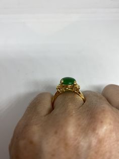 Vintage Lucky Green Nephrite Jade ring Fun jade is color enhanced Large green nephrite jade Ornate German Gold finished Vintage ring, does not tarnish, NOT sterling Size 6.5, 7 or 9 All rings are shipped free in the US in a nice gift box. Check out our over a THOUSAND great reviews Engraving is $4 per letter and is not always perfect depending on the piece. It can take a few days if the jeweler is busy. This is payable to Paypal Judithsltd@gmail.com Fine Jewelry Green Oval Cabochon Rings, Green Cabochon Fine Jewelry Rings, Green Cabochon Rings Fine Jewelry, Oval Jade Rings Hallmarked, Vintage Green Opal Round Ring, Yellow Gold Jade Ring With Gemstone, Fine Jewelry Jade Rings With Polished Finish, Jade Rings Oval Cabochon For Anniversary, Green Cabochon Emerald Ring For Anniversary