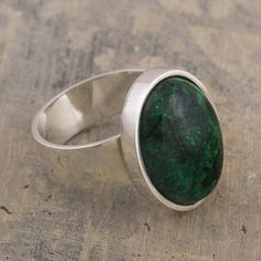 Leslie Granthon selects chrysocolla gem of wisdom and peace to crown the design of this ring. The blue-green is inlaid on a sterling silver ring that is crafted by hand in Peru. .925 Sterling silver. Chrysocolla Ring, Pearl Rings Vintage, Ring Inspo, Gemstone Ring Silver, Origami Jewelry, Pearl Rings, Ring Ideas, Sweet Love, Rings Cool