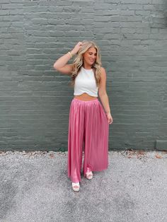 Experience luxury and comfort with our Don't Think Twice Pants! These pleated wide leg metallic pants feature an elastic waistband for the perfect fit. Add a touch of glamour to your wardrobe with these must-have pink pants. Elevate your style and confidence in every step. Inseam 29" Model is 5'1 Metallic Pants, Pink Pants, Must Haves, Wide Leg, Perfect Fit, Confidence, Elastic, Wardrobe, Pants