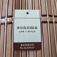 a bamboo placemat with a label for someone's life and style