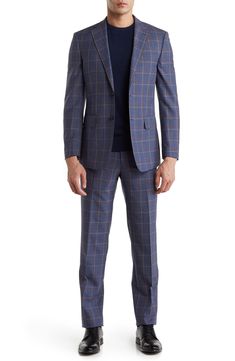 Give your reputation a clean slate with a modern tailored plaid suit featuring a classic notch lapel jacket and flat front trousers. Jacket has notched lapels; chest welt pocket; patch pockets Trousers have zip fly with button closure; front slant pockets; back button-welt pockets 70% wool, 13% polyester, 15% Tencel, 2% linen Dry clean Imported Model stats: 6'1" height, 32" waist. Model is wearing size 40R. Plaid Suits With Welt Pockets And Suit Collar, Tailored Plaid Suit With Notch Lapel, Plaid Single Breasted Suits For Business Casual, Plaid Suit With Suit Collar For Business Casual, Plaid Suits With Notch Lapel And Welt Pockets, Plaid Notch Lapel Suit For Business Casual, Tailored Plaid Suits For Business Casual, Fitted Plaid Suit With Notch Lapel, Fitted Plaid Single Breasted Suit