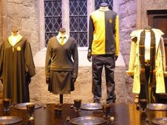 three mannequins dressed in harry potter costumes