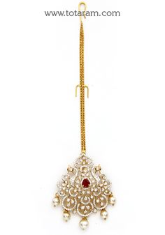 18 Karat Gold "Detachable - Peacock" Diamond Maang Tikka cum Pendant - Papidi Billa with Color Stones & South Sea Pearls
  This Product can be used as pendant.
  This product has Inter Changeable Stones in the pendant. 
  Gross Weight of the Pendant without Chain : 12.300 Grams
  Gross Weight of the Chain without Pendant : 1.950 Grams
  Length of the Pendant : 2.15 inches
  Width of the Pendant :  1.25 inches
 - 235-GT477 - in 14.250 Grams for USD $2,903.54 USD. 
Made in India by Totaram Jeweler Luxury Bollywood Pendant Jewelry, Luxury Tikka With Stone Work For Reception, Luxury Gold Tikka With Stone Work, Yellow Gold Kundan Jewelry For Puja, Elegant Kundan Necklace With Peacock Design For Puja, Yellow Gold Temple Jewelry Tikka For Festive Occasions, Diwali 22k Gold Tikka With Intricate Design, Festive Yellow Gold Tikka In Temple Jewelry Style, Traditional Hand Set Jewelry For Puja