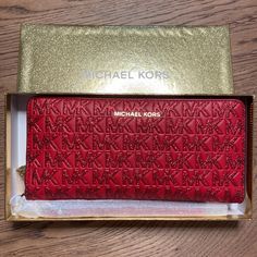 Michael Kors Crimson Jet Set Travel Continental Zip Around Long Wallet 100% Authentic Features: - Material: Polyester, Canvas, Glitter - Color: Red (Crimson) - Zip-Around - Multiple Credit Card Slots And Cash Holders Inside Measurements: 8.25" X 4'' X 0.75" 8/24/23#3-2 Michael Kors Luxury Bifold Wallet, Designer Red Wallet With Interior Card Slots, Luxury Red Wallet With Original Box, Designer Red Wallets With Interior Card Slots, Elegant Evening Wallets By Michael Kors, Designer Red Wallet For Travel, Elegant Michael Kors Evening Wallets, Elegant Evening Michael Kors Wallets, Red Rectangular Wallet